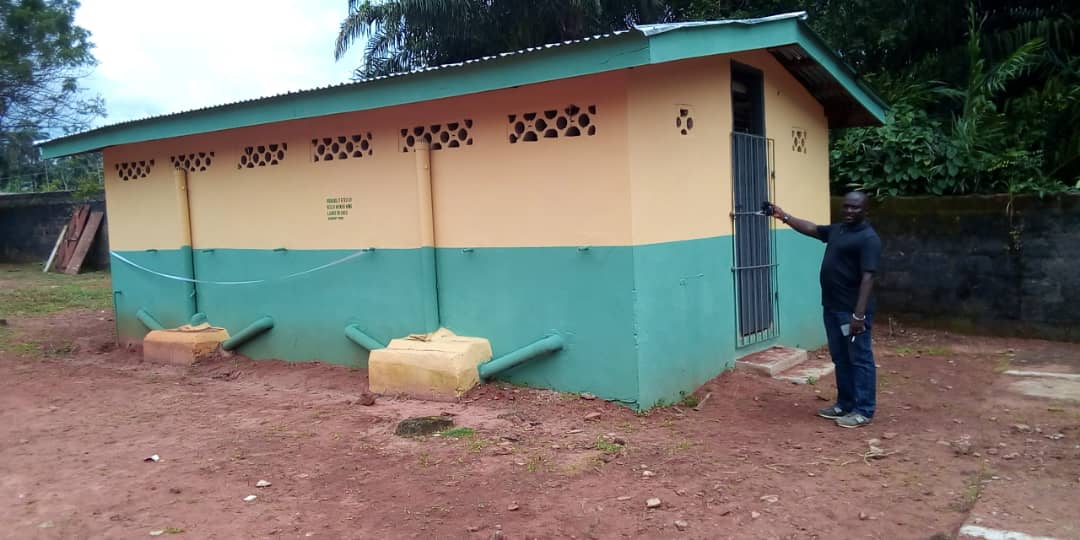 Nimo Women Hand Over Rehabilitated Toilet Facilities To School