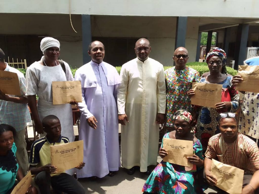 Bishop Ezeokafor Of Awka Catholic Diocese Empowers 35 Less Privileged Individuals Through JDPC